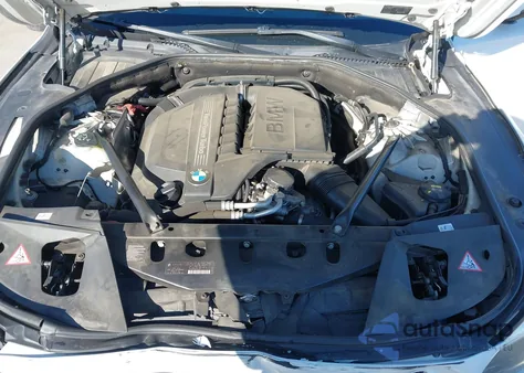 2015 BMW 740I из США, поврежденный, VIN WBAYA6C59FGK16663